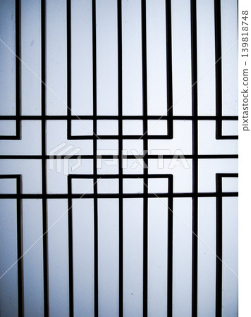 The geometric lines of the shoji screen reflect the silence. The geometric lines of the shoji screen reflect the silence. 139818748