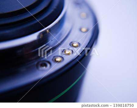 Macro photography of electronic contacts on a camera lens Macro photography of electronic contacts on a camera lens 139818750