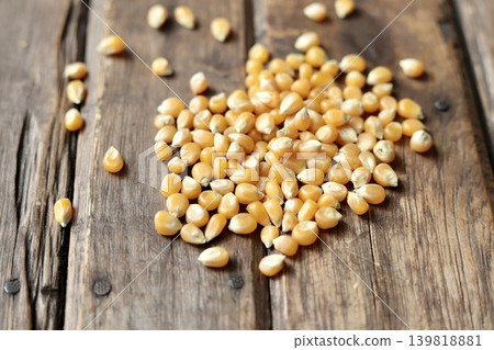 Butterfly-shaped popcorn kernels before heating 139818881
