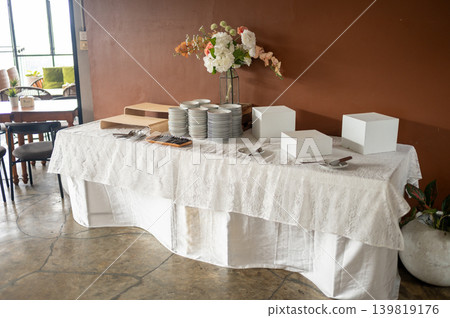 Elegant wedding buffet table display with luxury food serving arrangement Elegant wedding buffet table display with luxury food serving arrangement 139819176