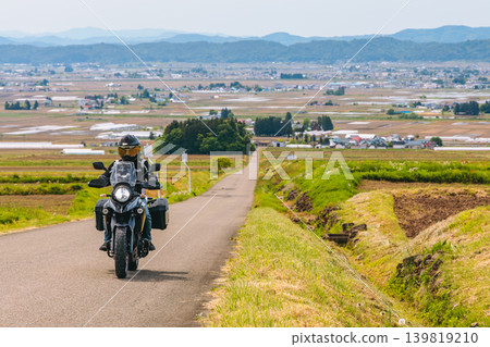 Motorcycles riding up Koibitozaka Hill in Kitakata City Motorcycles riding up Koibitozaka Hill in Kitakata City 139819210