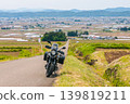 Motorcycles riding up Koibitozaka Hill in Kitakata City 139819211
