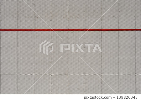 Modern Perforated Metal Facade with Red Line Modern Perforated Metal Facade with Red Line 139820345