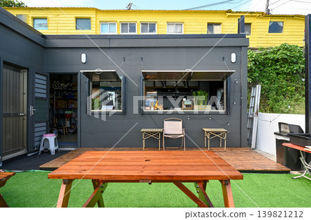 026 summer Taiwan remote island trip: modern industrial style black special features of the storehouse restaurant architecture exterior view and outdoor sitting area 026 summer Taiwan remote island trip: modern industrial style black special features of the storehouse restaurant architecture exterior view and outdoor sitting area 139821212
