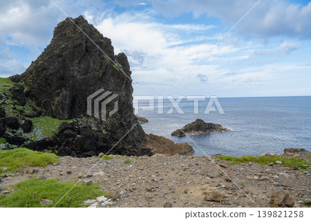Summer Taiwan remote island scenery: Taitung Lanyu Ring Island Highway, famous landmarks, steel rocks, black volcanic megaliths, and open Pacific Ocean seascape Summer Taiwan remote island scenery: Taitung Lanyu Ring Island Highway, famous landmarks, steel rocks, black volcanic megaliths, and open Pacific Ocean seascape 139821258