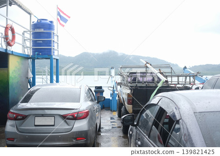Cars and Pickup Trucks Parked on Ferry Boat Crossing to Koh Lanta Krabi Cars and Pickup Trucks Parked on Ferry Boat Crossing to Koh Lanta Krabi 139821425