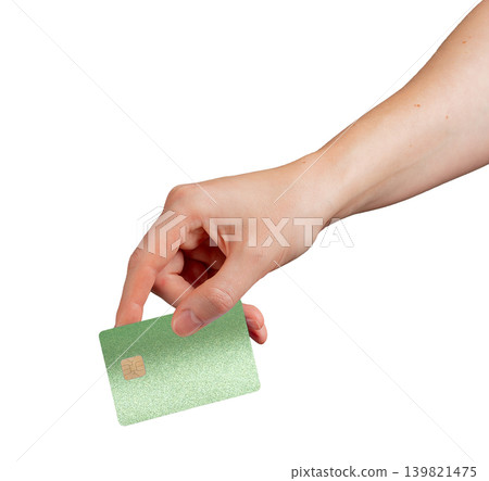 Hand holding green bank card isolated on background. Payment card gripped between fingers. Financial banking concept for purchase transaction and spending.. Hand holding green bank card isolated on background. Payment card gripped between fingers. Financial banking concept for purchase transaction and spending.. 139821475