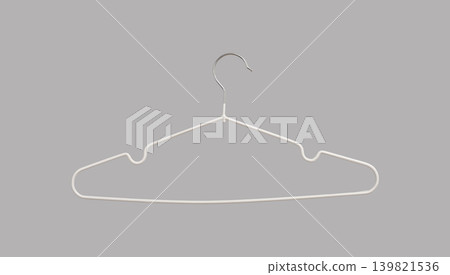 Thin clothing hanger with non slip coating on neutral background. Lightweight wardrobe accessory with metal hook. Storage tool designed for careful garment hanging.. Thin clothing hanger with non slip coating on neutral background. Lightweight wardrobe accessory with metal hook. Storage tool designed for careful garment hanging.. 139821536