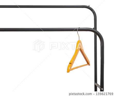 Wood hanger, hook hanging on metal rod, clothing rail isolated on white background. Wood hanger, hook hanging on metal rod, clothing rail isolated on white background. 139821769