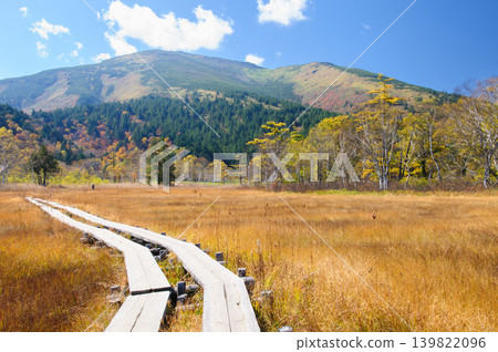 Mount Shibutsu and autumn foliage viewed from Oze Marsh in Katashina Village, Gunma Prefecture. Mount Shibutsu and autumn foliage viewed from Oze Marsh in Katashina Village, Gunma Prefecture. 139822096