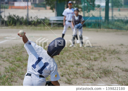 A young baseball player who is working hard to become a professional baseball player A young baseball player who is working hard to become a professional baseball player 139822180
