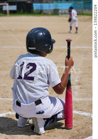 A young baseball player who is working hard to become a professional baseball player 139822204
