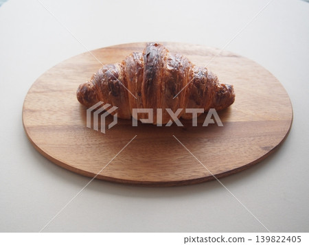 croissant on cutting board croissant on cutting board 139822405