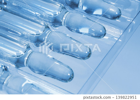 Medical ampoules on the plastic tray close up Medical ampoules on the plastic tray close up 139822951