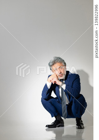 Sitting businessman 139822996