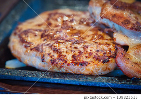 A delicious-looking grilled hamburger lunch. A delicious-looking grilled hamburger lunch. 139823513