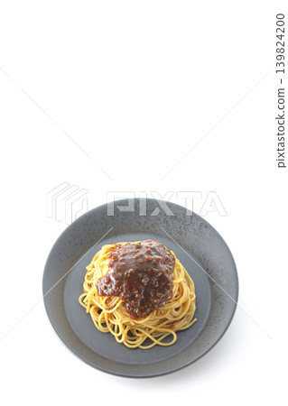 Spaghetti with meat sauce photographed alone against a white background. Spaghetti with meat sauce photographed alone against a white background. 139824200