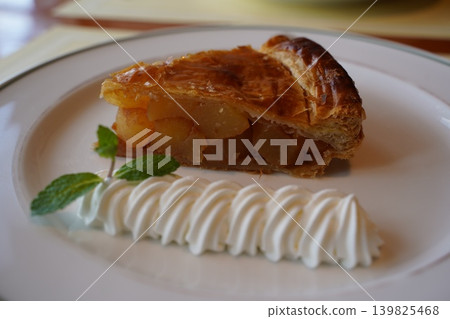 Apple pie with whipped cream Apple pie with whipped cream 139825468