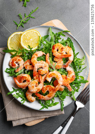Salad with grilled shrimps prawns and arugula greens Salad with grilled shrimps prawns and arugula greens 139825756