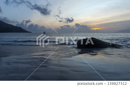 A tranquil cool coastal scene at blue dusk. Seychelles 139827312