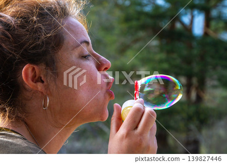 woman, blowing, bubbles 139827446
