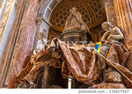 Tomb of Pope Alexander VII by Bernini inside Saint Peters Basilica with skeleton and marble statues. Tomb of Pope Alexander VII by Bernini inside Saint Peters Basilica with skeleton and marble statues. 139827507