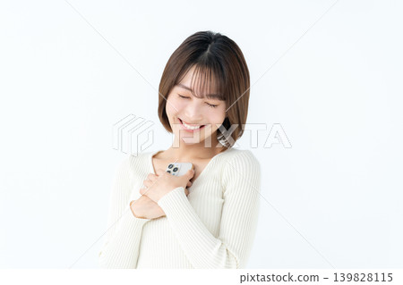 女性休閒智慧型手機 139828115