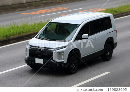 All-around minivan while driving All-around minivan while driving 139828695
