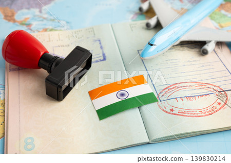 India flag with passport and airplane for travel. India flag with passport and airplane for travel. 139830214