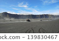 Off road tourist jeeps driving through the Sea of Sand desert at mount Bromo Indonesia 139830467