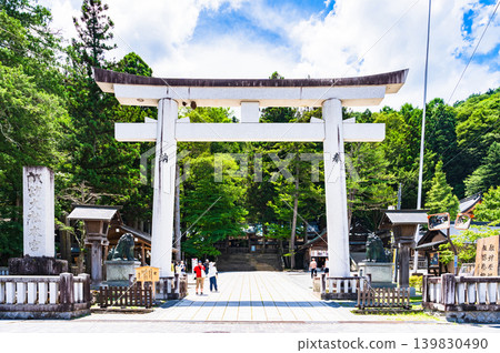 Exterior view of Suwa Grand Shrine, Upper Shrine, Main Sanctuary [Shrine around Lake Suwa, Nagano Prefecture] *Exterior photograph taken from outside the shrine grounds. 139830490