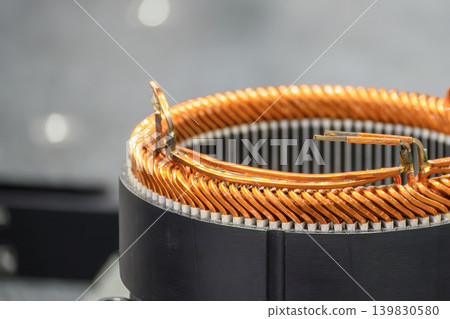 Close-up of a high-efficiency bar copper wire assembly inside a stator part for an electric vehicle (EV) motor. Close-up of a high-efficiency bar copper wire assembly inside a stator part for an electric vehicle (EV) motor. 139830580