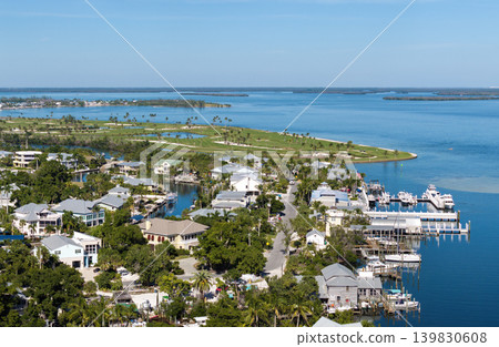 Wealthy waterfront residential area. Rich neighborhood with expensive vacation homes in Boca Grande, small town on Gasparilla Island in southwest Florida Wealthy waterfront residential area. Rich neighborhood with expensive vacation homes in Boca Grande, small town on Gasparilla Island in southwest Florida 139830608