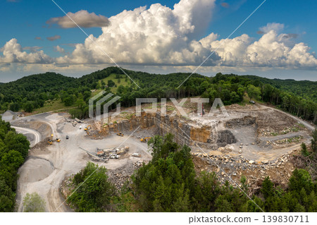 Sand open-pit mining quarry with processing plant for crushed stone. Extracting of natural resources for construction industry Sand open-pit mining quarry with processing plant for crushed stone. Extracting of natural resources for construction industry 139830711