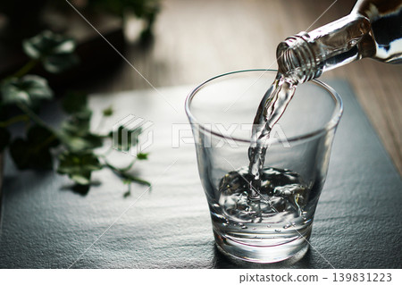 Mineral water being poured into a glass Mineral water being poured into a glass 139831223