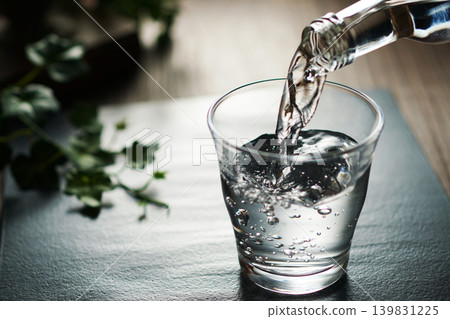 Mineral water being poured into a glass Mineral water being poured into a glass 139831225