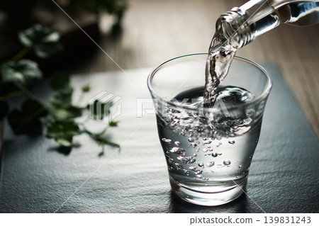 Mineral water being poured into a glass Mineral water being poured into a glass 139831243