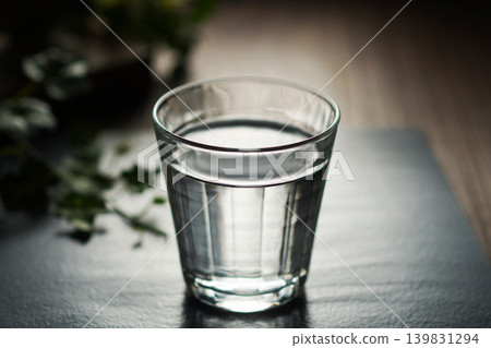 Mineral water poured into a glass Mineral water poured into a glass 139831294
