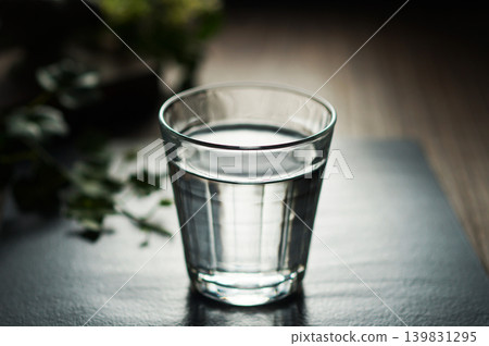 Mineral water poured into a glass Mineral water poured into a glass 139831295