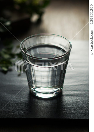 Mineral water poured into a glass Mineral water poured into a glass 139831299