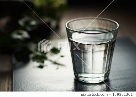 Mineral water poured into a glass 139831301