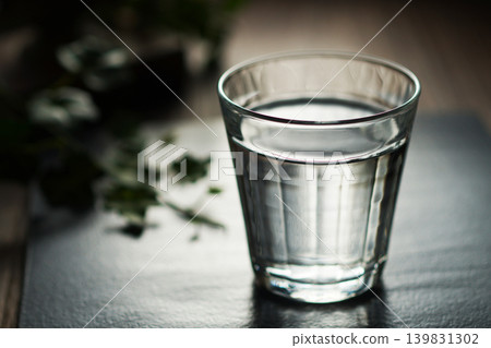 Mineral water poured into a glass Mineral water poured into a glass 139831302