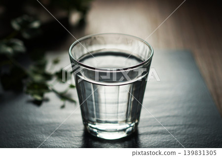 Mineral water poured into a glass Mineral water poured into a glass 139831305