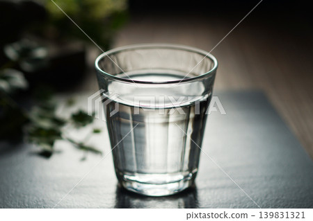 Mineral water poured into a glass Mineral water poured into a glass 139831321