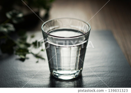 Mineral water poured into a glass Mineral water poured into a glass 139831323
