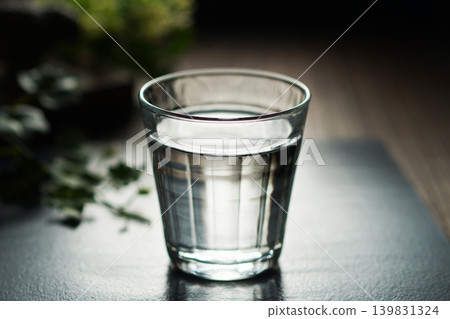 Mineral water poured into a glass Mineral water poured into a glass 139831324