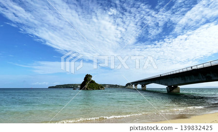Kouri Island in northern Okinawa Prefecture: A breathtaking view of Kouri Bridge and the emerald green sea in Yanbaru. Kouri Island in northern Okinawa Prefecture: A breathtaking view of Kouri Bridge and the emerald green sea in Yanbaru. 139832425