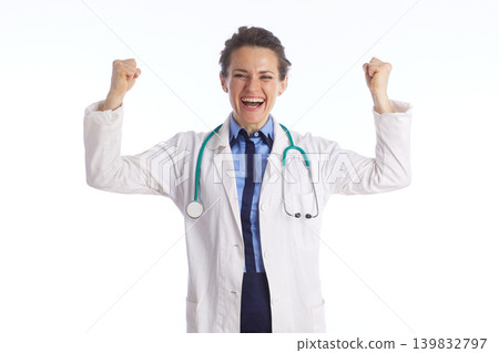 Joyful Female Doctor Celebrating Medical Success Joyful Female Doctor Celebrating Medical Success 139832797