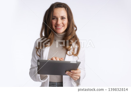 Engaged Healthcare Expert Using Digital Tablet Engaged Healthcare Expert Using Digital Tablet 139832814