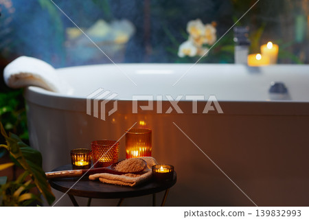 Tranquil Bath Scene with Candles and Aromatherapy Salts Tranquil Bath Scene with Candles and Aromatherapy Salts 139832993